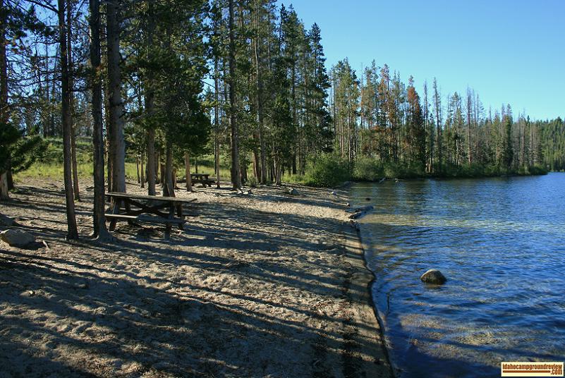 view of the cute little beach at Pettit Lake Campground on Petit Lake.
