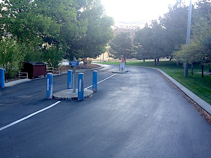 A picture of the RV dump station at the entrance to Woodhead Park. It is free to campers.
