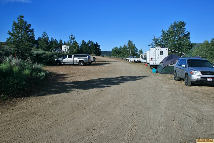 Campsites 4 thru 8 are stretched out to the right side of this road. You park on the road and your site is below next to the lake.