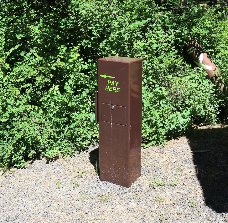 A picture of the fee "Pay Here" box in Laird Park in northern Idaho.