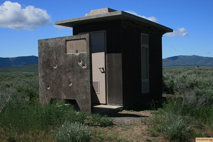 There are a couple of these old beat-up outhouses not far from the docks.