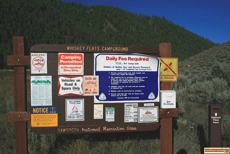 The information sign with camping rules and warnings at Whiskey Flats Campground.
