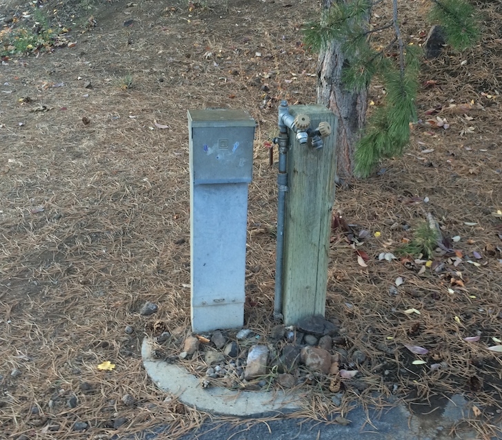 A picture of the water and electrical hookups in Woodhead Park.