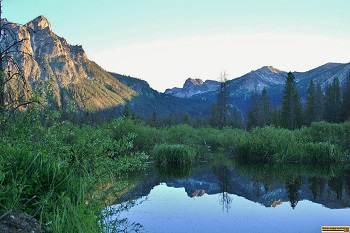 view of Mt McGown reflected in a pond just above Stanley Lake