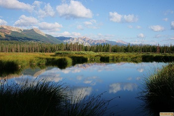 picture of the sawtooth mountains reflction on a small pond near alturas lake